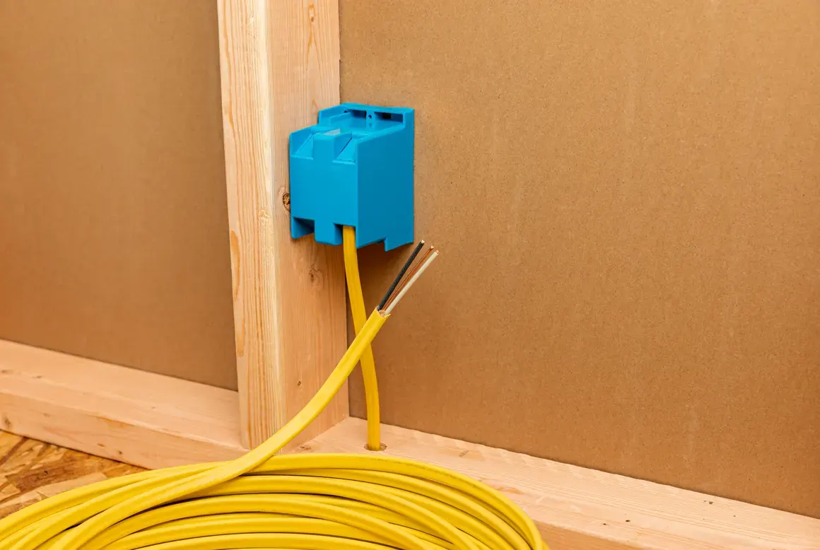 Remodel rough-in — new circuit boxes and wiring in fresh framing
